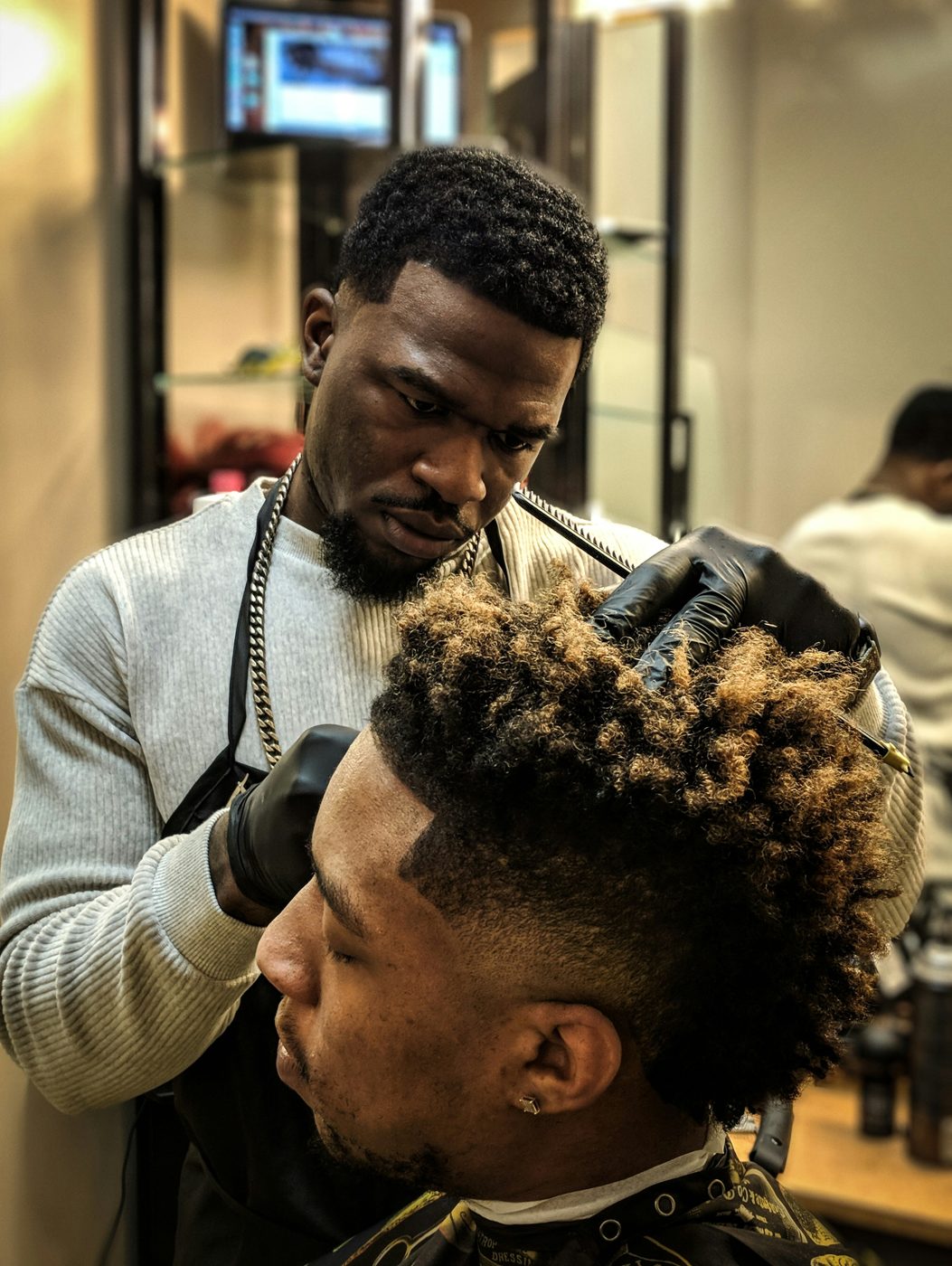 A fresh fade being finished at the barbershop